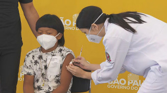 Davi Seremramiwe Xavante, primeira criança vacinada contra a Covid no Brasil — Foto: Reprodução/TV Globo